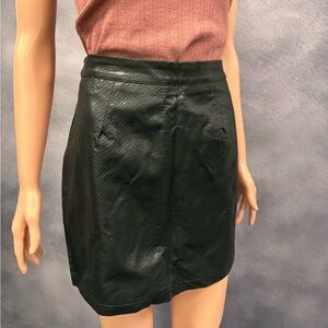 Black faux leather skirt.  Size M